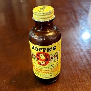 vintage empty bottle of Hoppe's No. 9 Nitro Powder